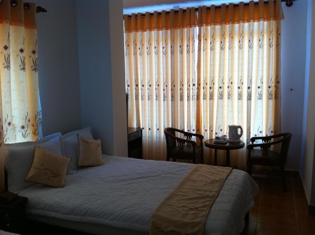 Minh Quan Hotel Bao Loc Habitación foto